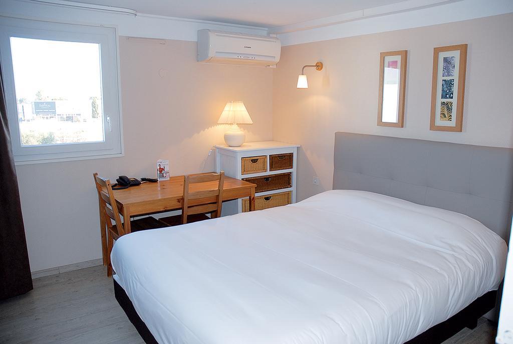 Contact Hotel Le Sud Montpellier Aeroport Parc Expo Arena Могио Экстерьер фото
